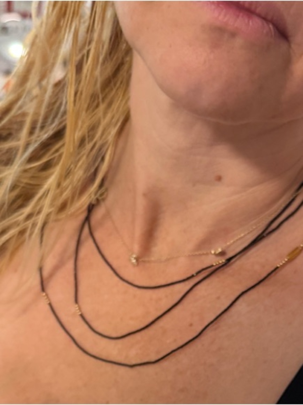Elegant Black Beaded Layered Necklace with Gold Accents